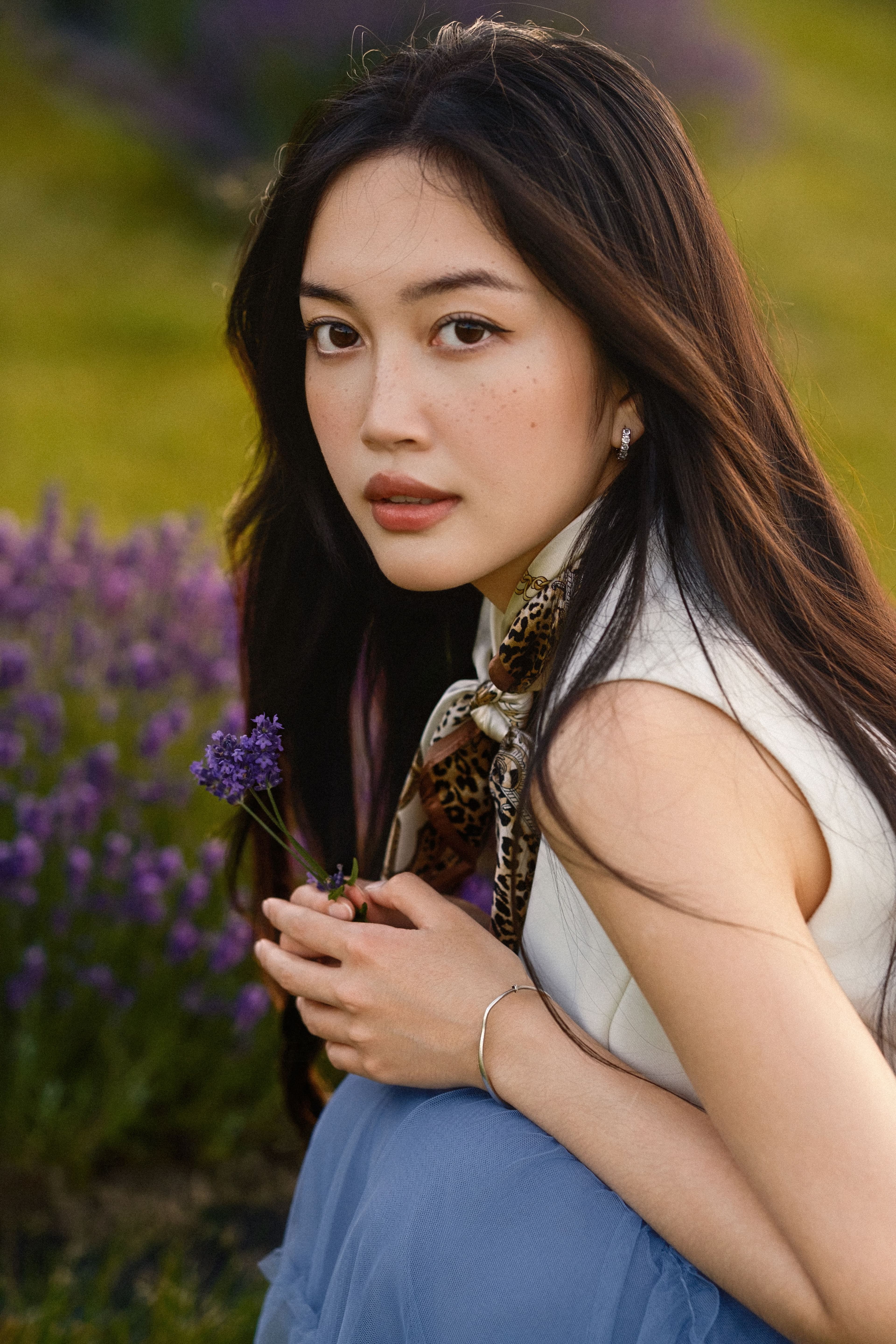 Natural light portrait of a woman in a lavender field